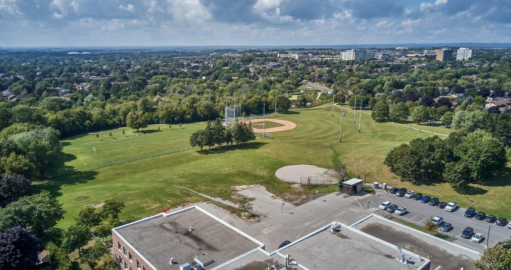 Aerial view of green field in a park in Whitby, Ontario